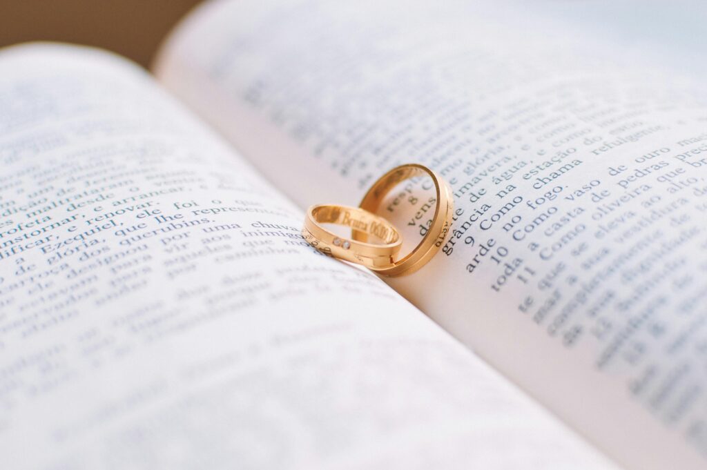 wedding rings on open bible