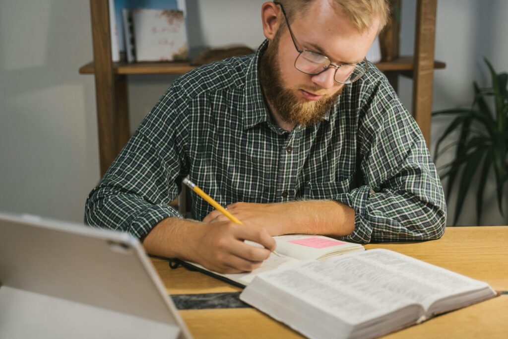 man studying Bible